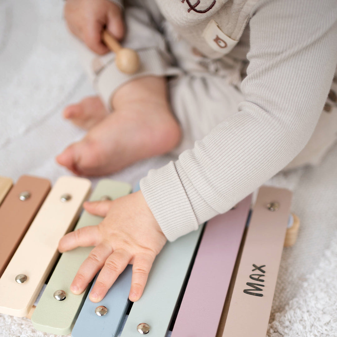 Baby Milestones Month by Month: Your Complete Guide to 10–12 Months